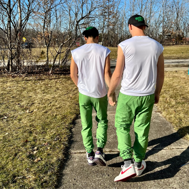 Couple walking in the nature wearing VIVRE'